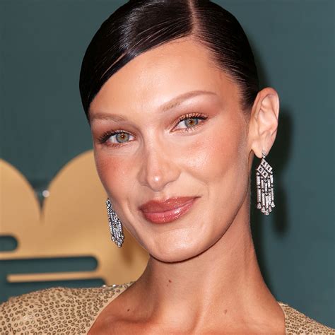 Bella Hadid Shows Off Her Toned Tanned Stomach While Rocking The