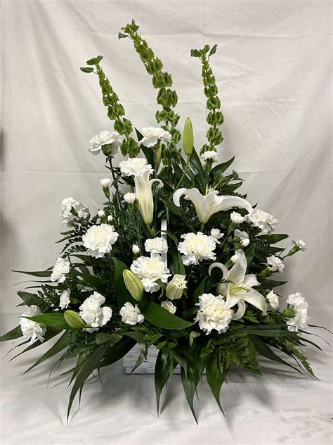 Peaceful White Lilies Basket By Teleflora In Dunbar Wv Arts Flower Shop