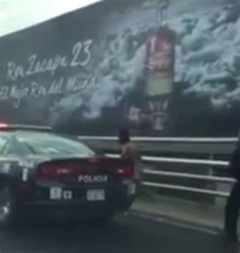 Naked Man Chased Down Busy Mexico City Motorway By Police Officer Daily Mail Online