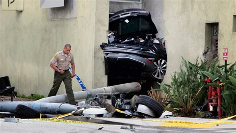 Tesla Splits In Half After Police Chase Crash