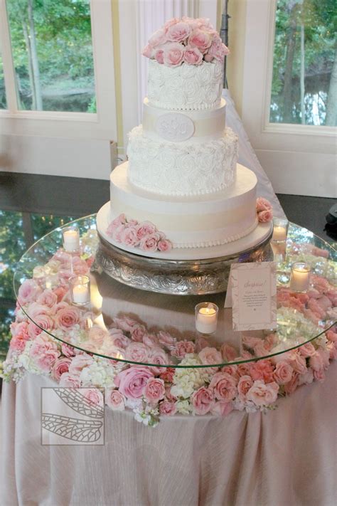 Wedding Cake Table Decorations With Candles, Flowers And Lights