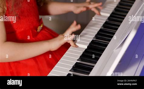 Little Baby Girl Or Child Professional Pianist Plays Classical Music On