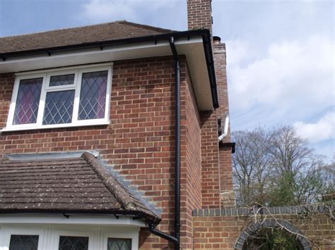 Installation of Black PVC Guttering and White UPVC Barge-Boards ...