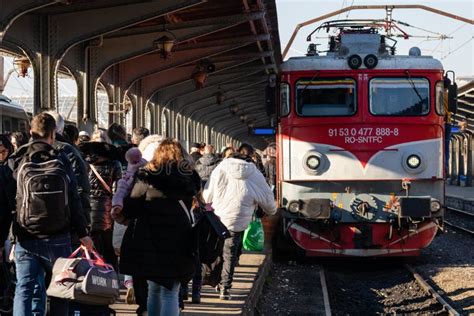 People Getting On And Off The Train At Bucharest North Railway Station