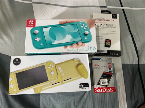 Nintendo Switch Lite Turquoise Bundle Video Gaming Video Game