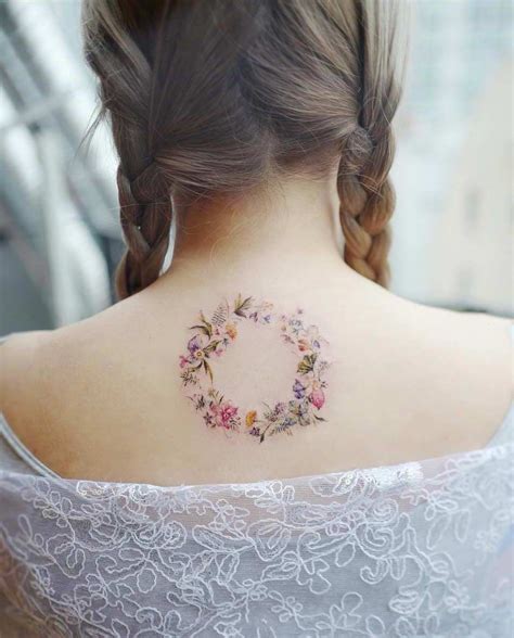 A Floral Wreath By Banul Wreath Tattoo Gorgeous Tattoos Flower Tattoo