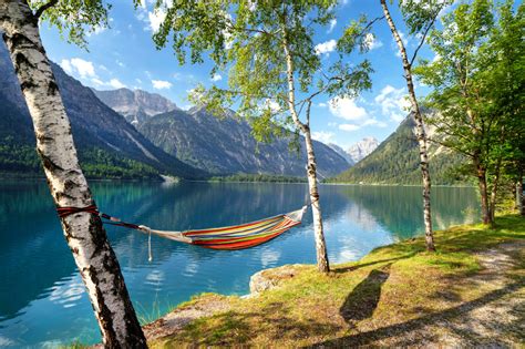 Colorful Hammock Near A Mountain Lake Jigsaw Puzzle In Great Sightings