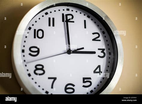 Clock On The Wall Showing The Time Of 3 Oclock Stock Photo Royalty