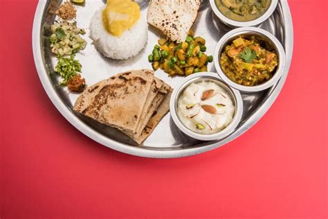 Maharashtrian or marathi food platter or marathi food thali , pune, mumbai konkan, vidarbha food ...