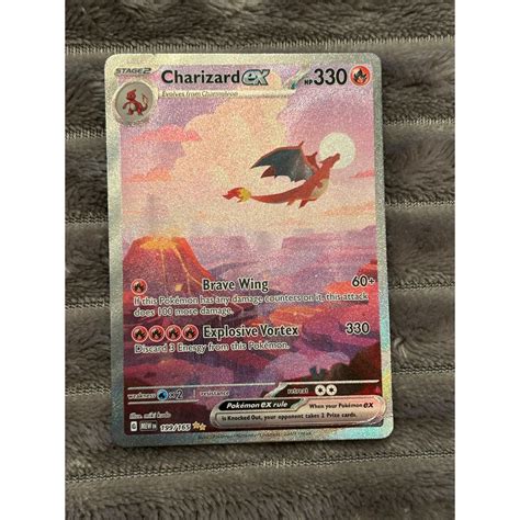 Se produkter som liknar Pokemonkort Charizard EX 199 på Tradera