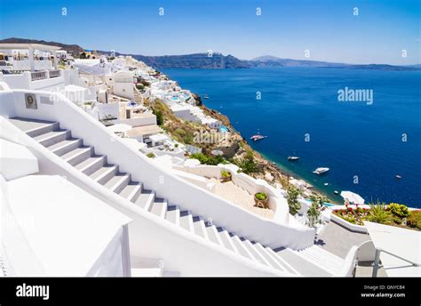 Steps Leading To A Luxury Hotel Overlooking The Caldera At Oia