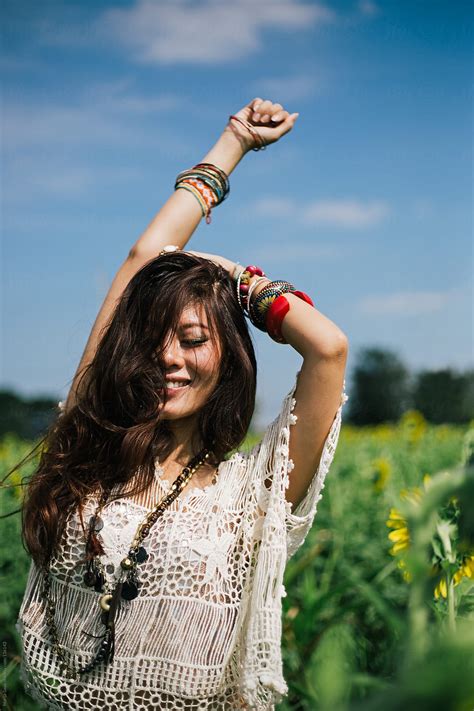 Woman In The Sunflower Field By Stocksy Contributor Marija Savic