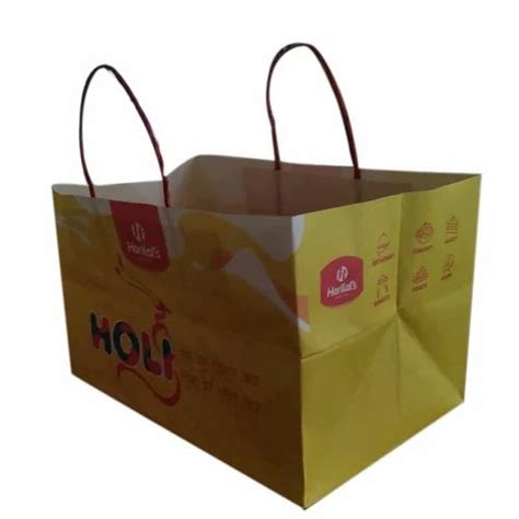 Yellow Base Kg Printed Paper Carry Bags For Shopping At Rs Piece