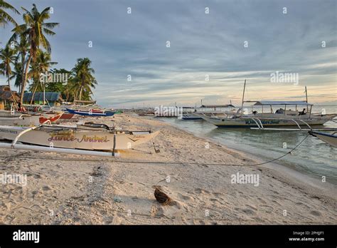 An Idyllic White Sand Beach Of Pamilacan Island In The Philippines With