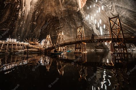 Premium Photo | Underground theme park in big salt mine Salina Turda ...