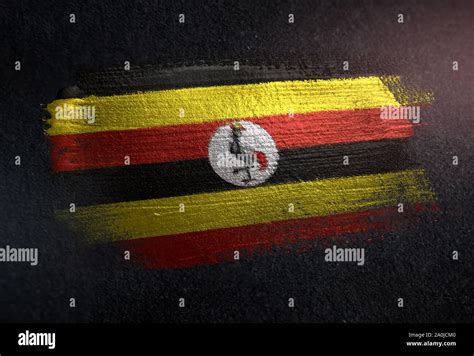 Uganda Flag Made Of Metallic Brush Paint On Grunge Dark Wall Stock