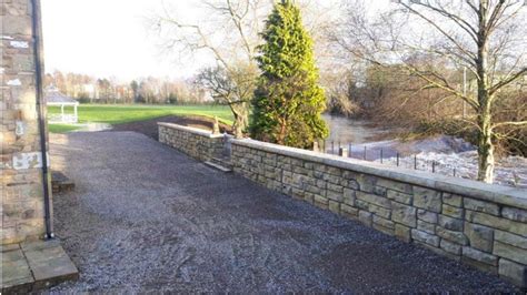 Flood Walls Using Redi Rock Precast Modular Blocks