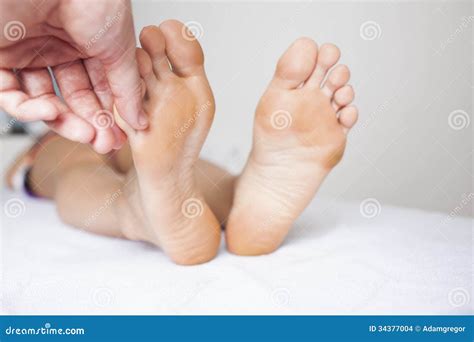 Applying Toe Massage On Small Big Toe Stock Images Image 34377004