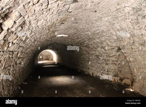 ancient dark secret passage of a castle Stock Photo - Alamy