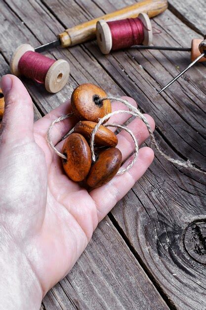 stringing beads   string premium photo