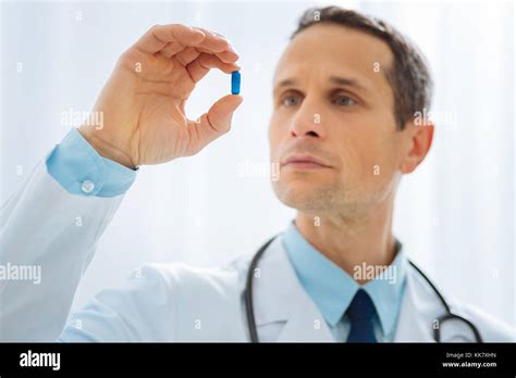 Attentive Brunette Doctor Checking Up Medicine Stock Photo Alamy