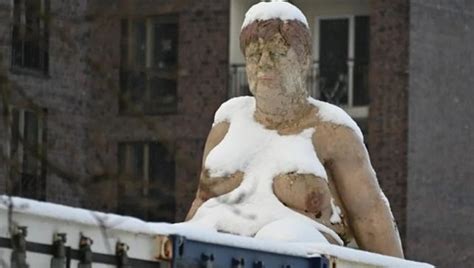 The Sculpture Of Angela Merkel Naked In The Snow Causes Strong Debate