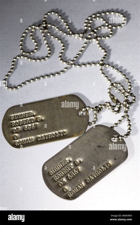 Army dog tags hi-res stock photography and images - Alamy