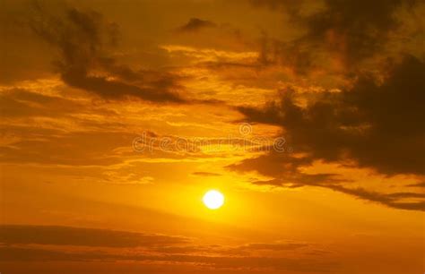 Panorama Of Golden Hour Sky With Sun And Clouds Background Stock Photo