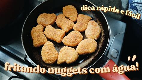 NUGGETS DE FRANGO EMPANADO FRITO ÁGUA CHICKEN NUGGETS FRIED WITH