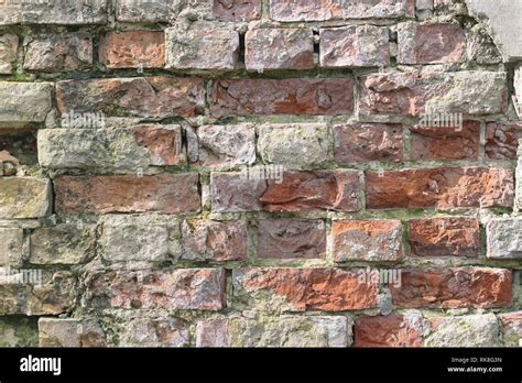 Old Vintage Cracked Rough Brick Wall Textured Grunge Background Stock