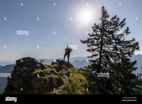 Sun Shining Silhouette Male Hiker Standing Alone Mountaintop Hi Res