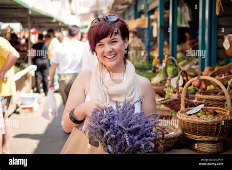 Happy Young Women At The Farmers Market Stock Photo Alamy