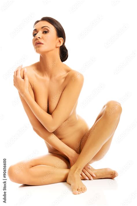 Nude Woman Sitting Crossed Legged On The Floor Stock Photo Adobe Stock