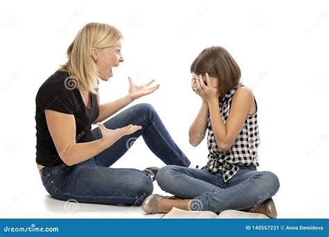 Mom Screaming At Teen Daughter Isolated On White Background Stock