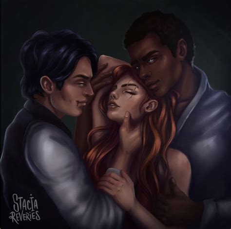 Two Men And A Woman Are Hugging In Front Of A Dark Background With The