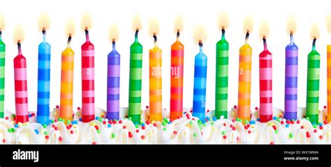 Brightly Colored Birthday Cake Candles Against A White Background Stock