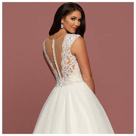 This Glamorous Gown Features A Beaded Lace Applique Bodice With An