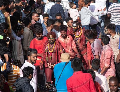 Image Of Pothuraju Surrounded By Crowd During Bonalu Festival