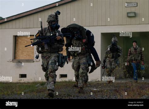 U S Army Spc Conner Crisafi Left Sgt Garret Paulson Center