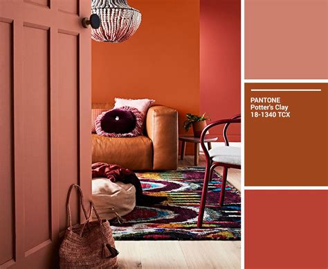 A Living Room In Varying Shades Of Orange Brown And Red Orange Dining