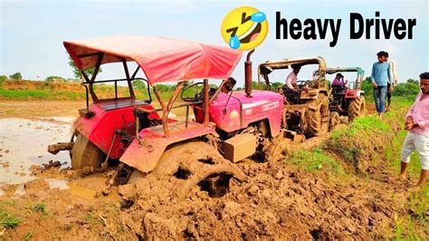 Tractor Stuck In Mud Rescued By Another Tractors Heavy Driver