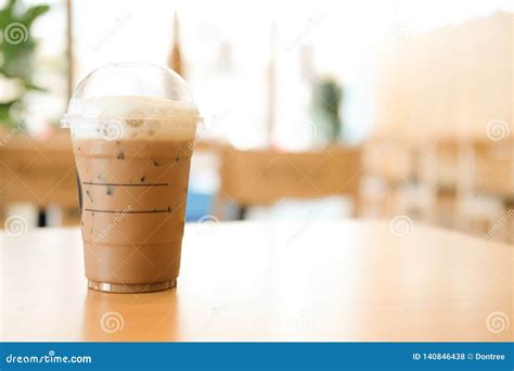 Iced Mocha Coffee In Take Away Glass On The Table Stock Photo Image