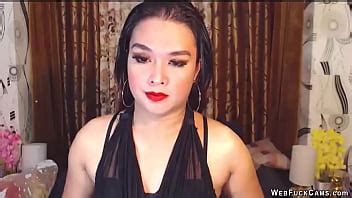 A Sexy Dark Haired Amateur Babe With Make Up In See Through Black Top