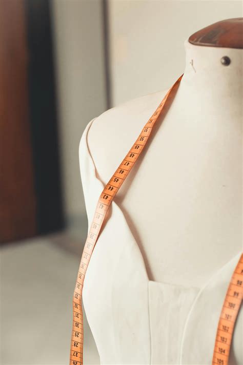 Measuring Tape on a Dress Form · Free Stock Photo