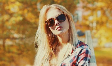 Sunny Portrait Of Beautiful Young Blonde Woman In Park Stock Image