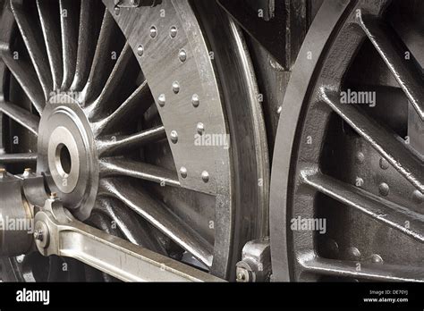 Steam train wheels close up detail shot of the chassis or running gear Stock Photo - Alamy