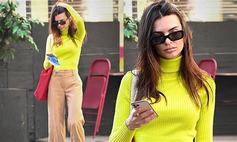 Emily Ratajkowski Shines In Clinging Yellow Turtleneck And Baggy Trousers Out In New York