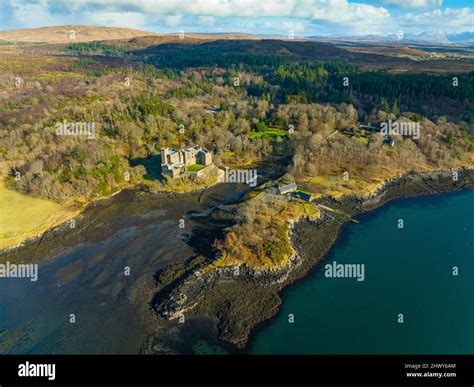 Aerial view from drone of Dunvegan Castle on the Isle of Skye, Scotland ...