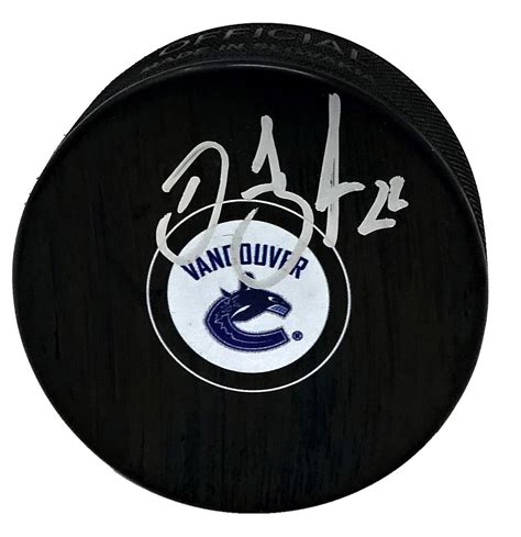 Daniel Sedin Autographed Vancouver Canucks Logo Puck – House of Hockey