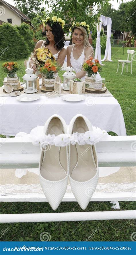 Two Lesbian Brides On Their Wedding Day Bride And Her Maid Of Honor On A Wedding Day Stock